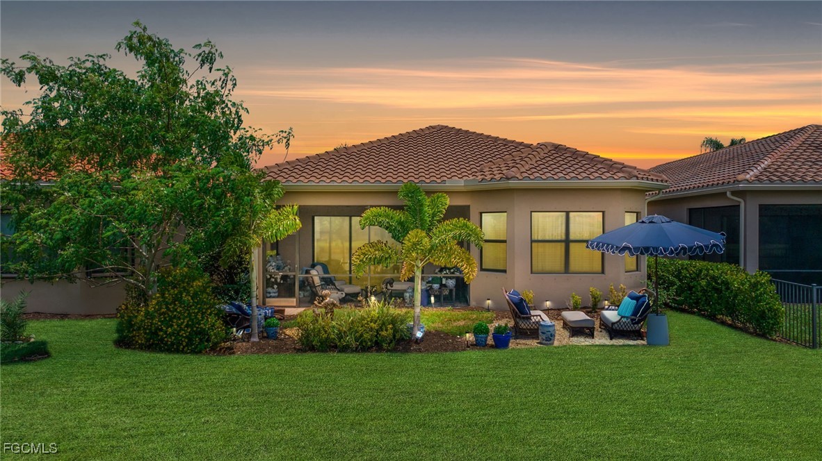 11643 Meadowrun Circle Fort Myers, FL 33913 - Photo 33 of 39 a view of a house with a backyard