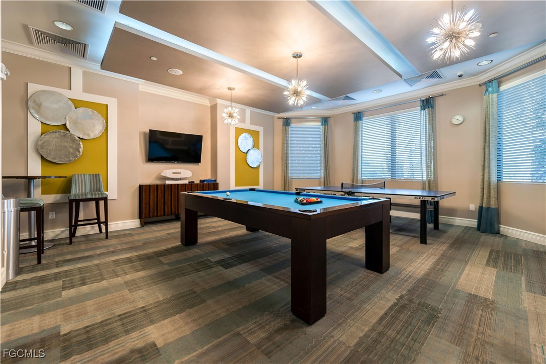 11643 Meadowrun Circle Fort Myers, FL 33913 - Photo 38 of 39 a living room with furniture pool table and a flat screen tv