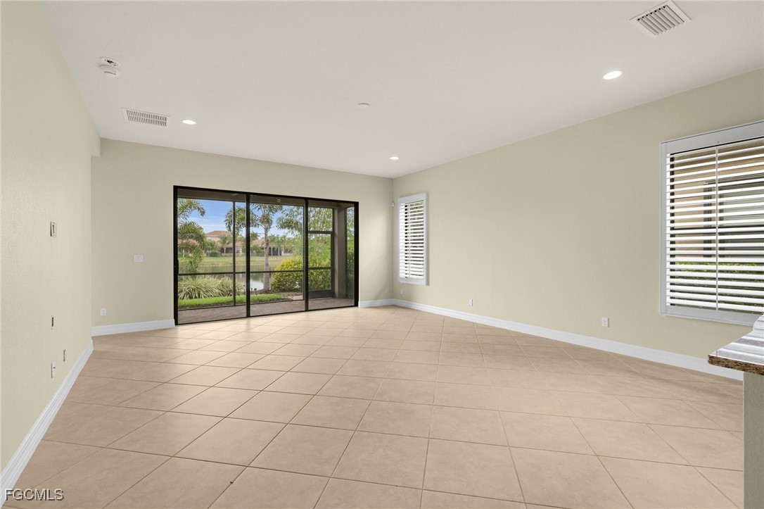 11643 Meadowrun Circle Fort Myers, FL 33913 - Photo 10 of 39 a view of an empty room with a window