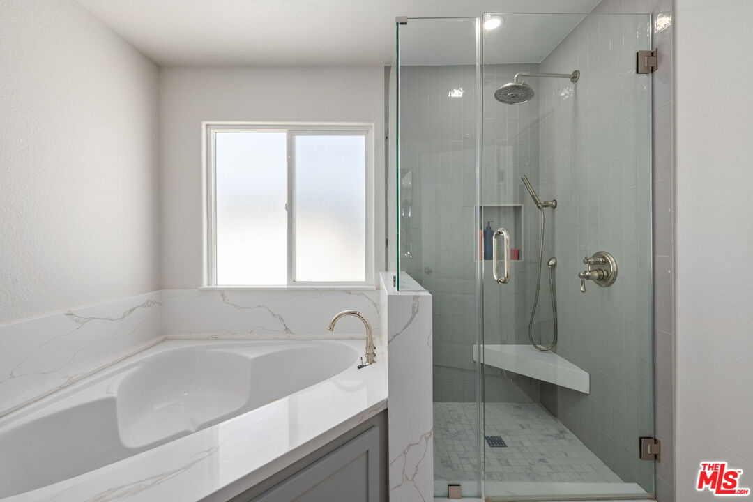 222 West Imperial Avenue, Unit 3 El Segundo, CA 90245 - Photo 14 of 24 a bathroom with a tub a sink and a window
