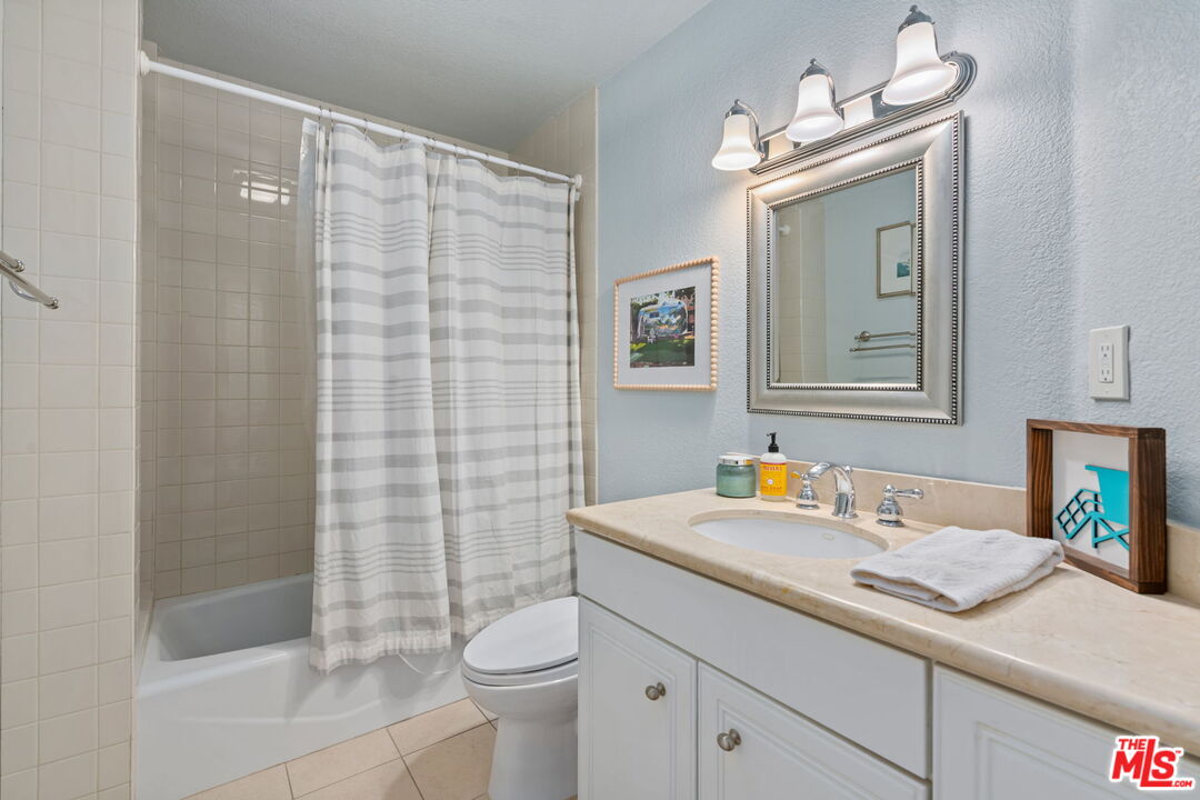 222 West Imperial Avenue, Unit 3 El Segundo, CA 90245 - Photo 17 of 24 a bathroom with a sink a toilet and shower