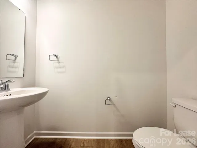 a bathroom with a sink and toilet
