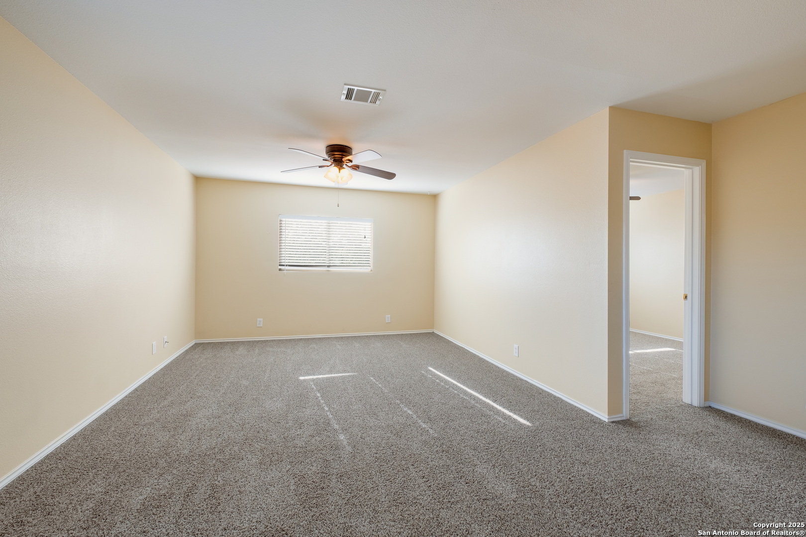 249 Michelle Lane Boerne, TX 78006 - Photo 14 of 17 an empty room with windows and closet