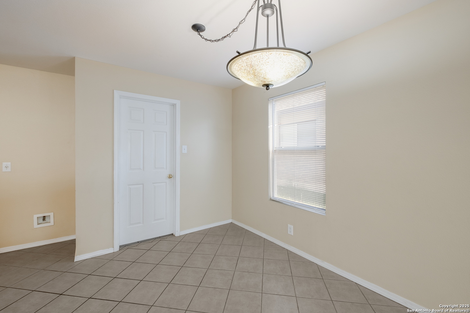 249 Michelle Lane Boerne, TX 78006 - Photo 7 of 17 a view of an empty room and window