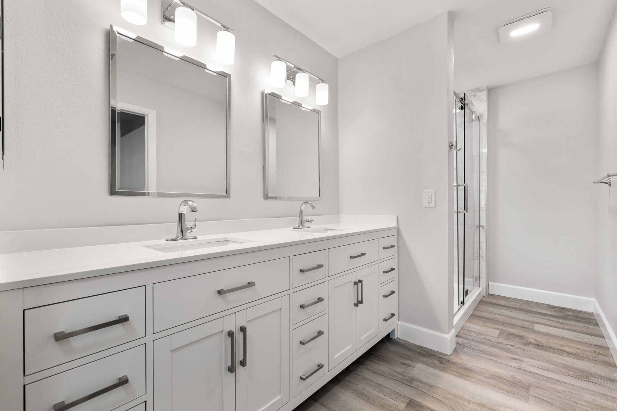 39495 Regency Way Palm Desert, CA 92211 - Photo 29 of 55 a bathroom with double vanity sink and a mirror