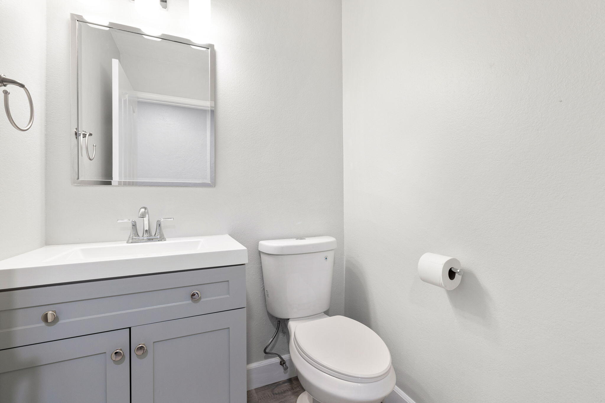 39495 Regency Way Palm Desert, CA 92211 - Photo 32 of 55 a bathroom with a granite countertop toilet sink and mirror