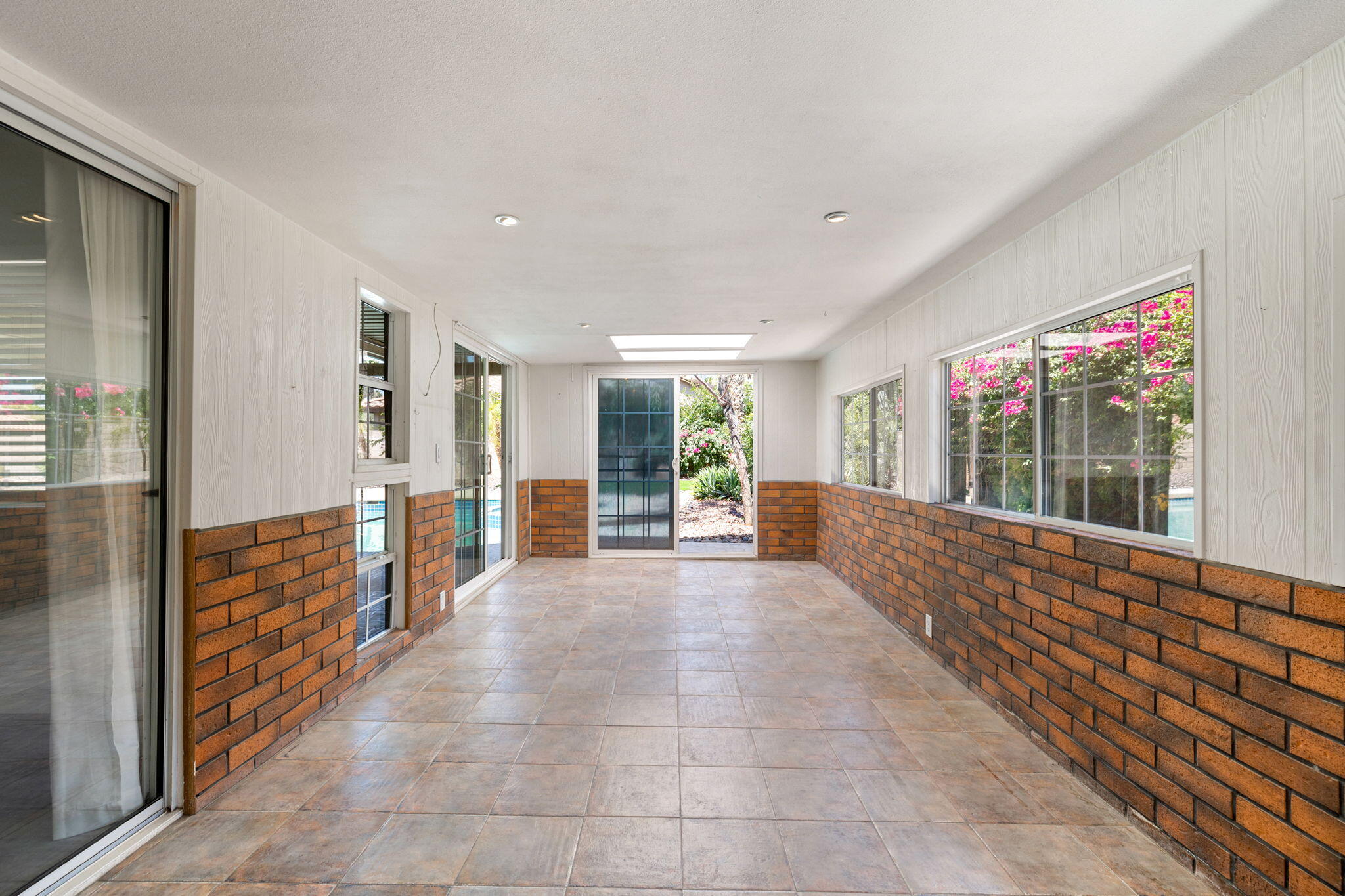 39495 Regency Way Palm Desert, CA 92211 - Photo 33 of 55 a view of an entryway with wooden door