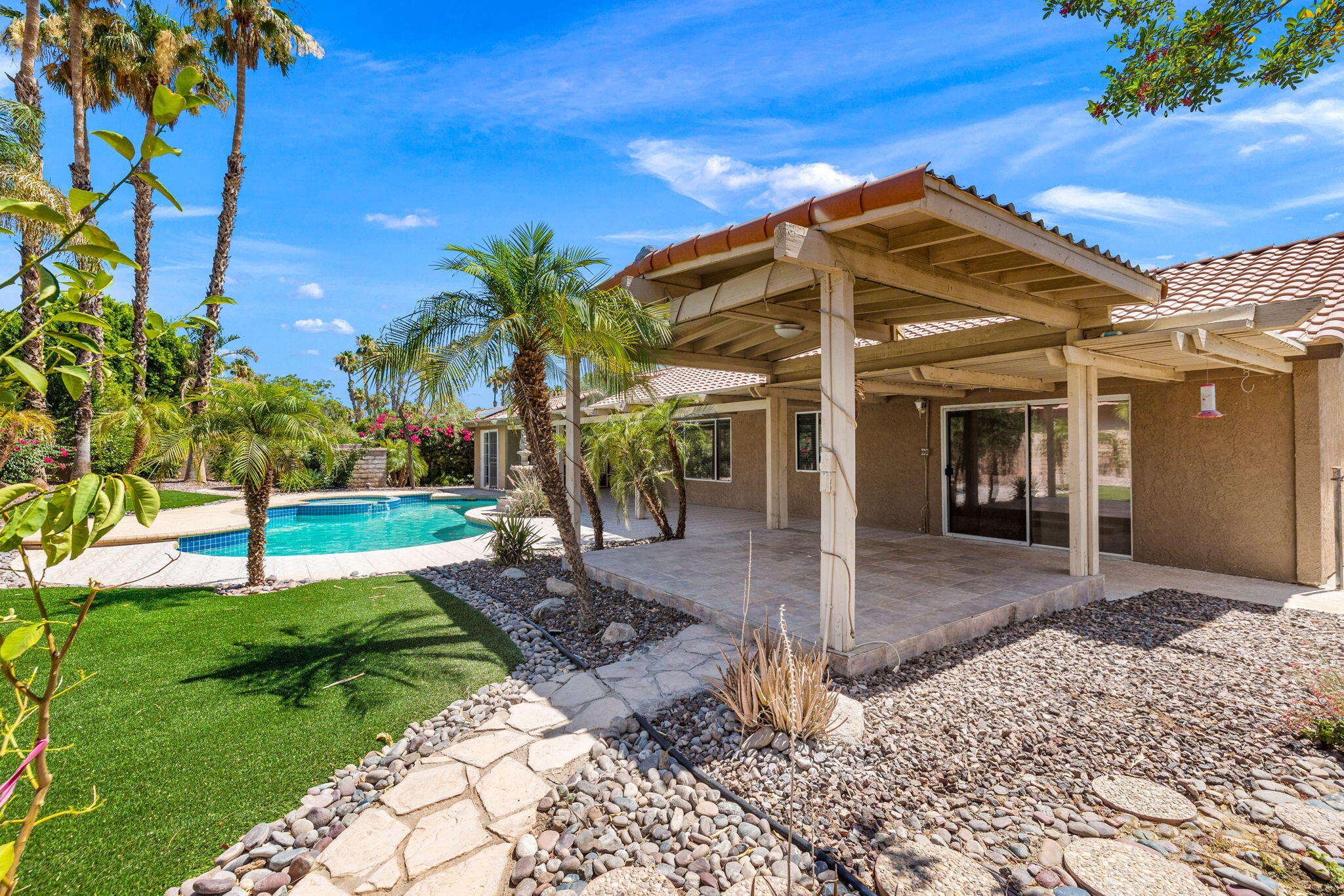 39495 Regency Way Palm Desert, CA 92211 - Photo 38 of 55 a view of a house with a porch