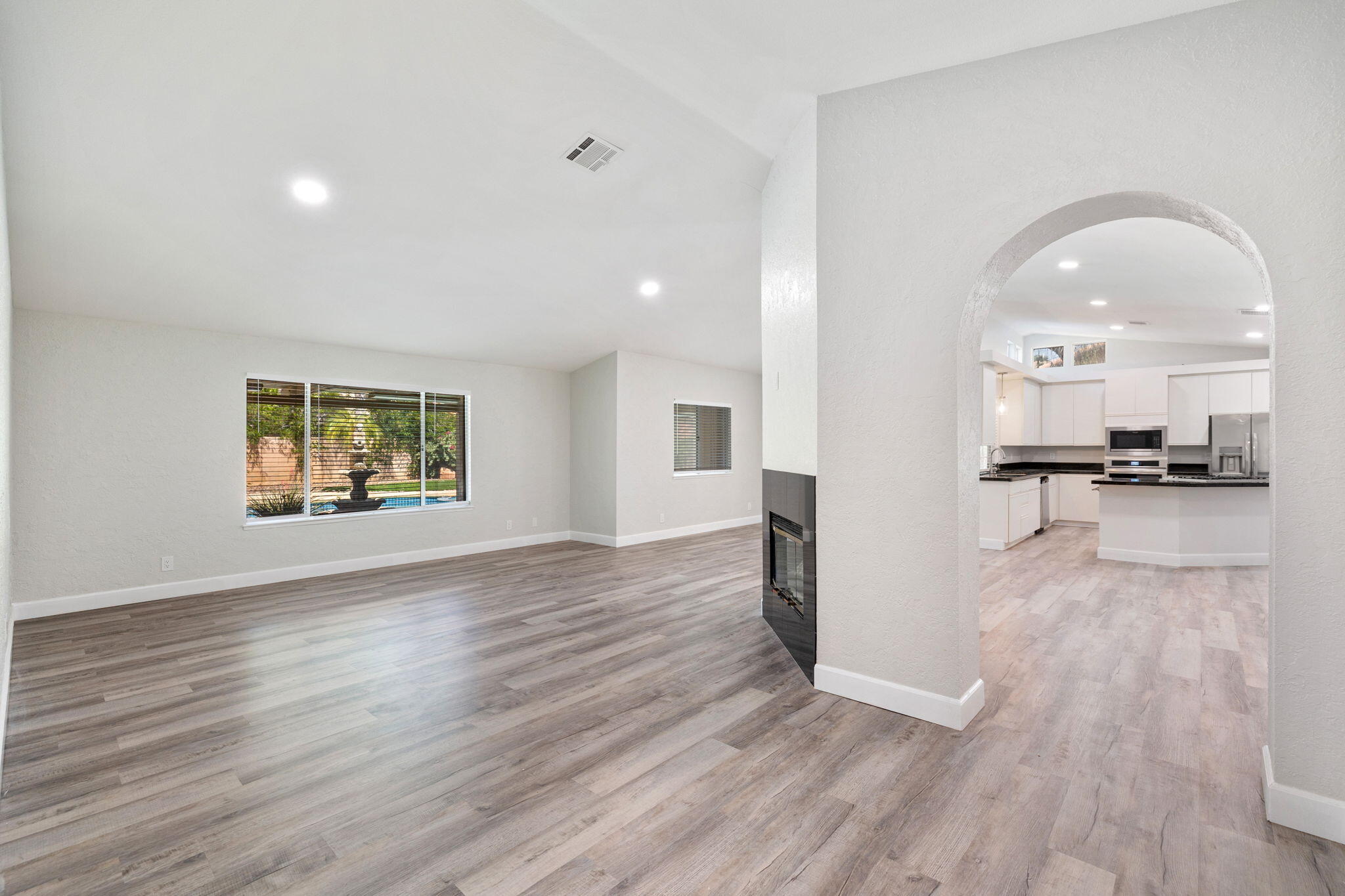 39495 Regency Way Palm Desert, CA 92211 - Photo 5 of 55 a view of kitchen with cabinets and wooden floor
