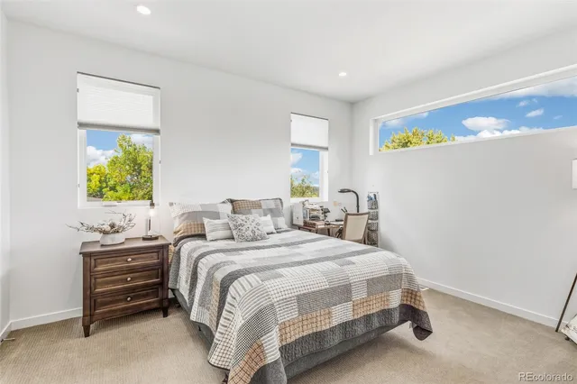 a bathroom with a double vanity sink and mirror