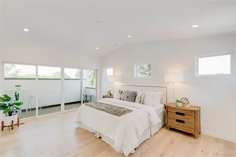 a view of balcony with wooden floor
