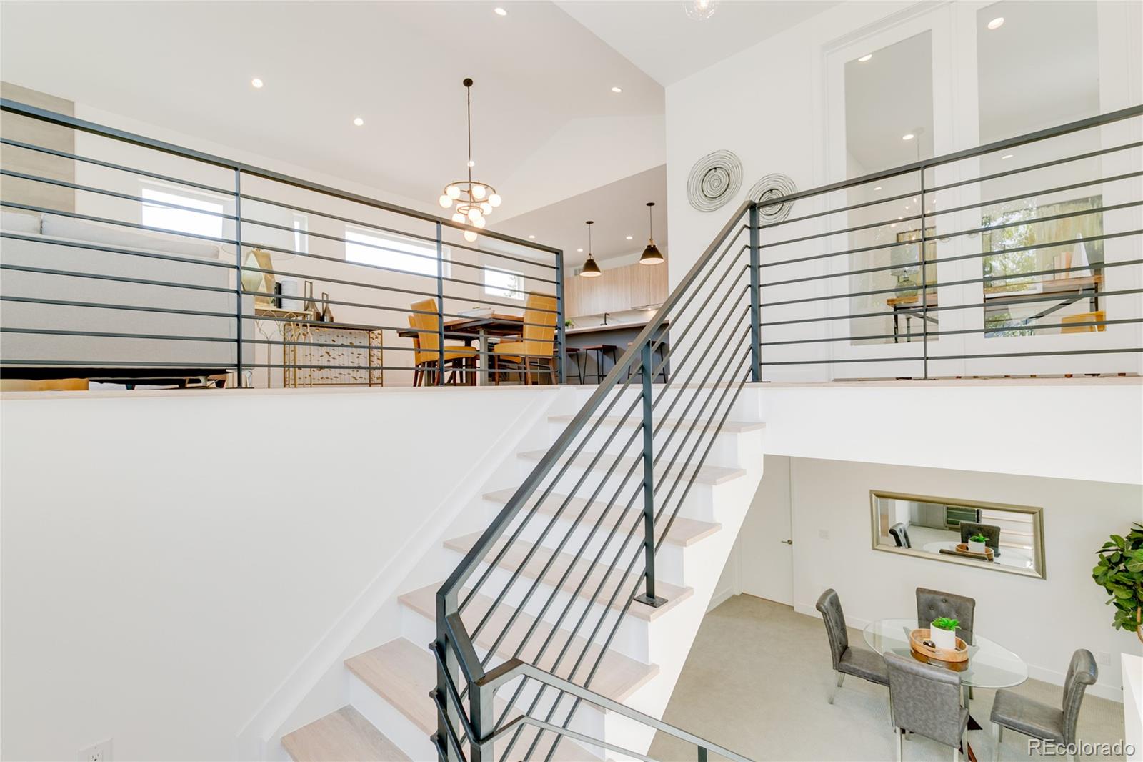 4077 Everett Street Wheat Ridge, CO 80033 - Photo 38 of 50 a view of entryway and hall with wooden floor