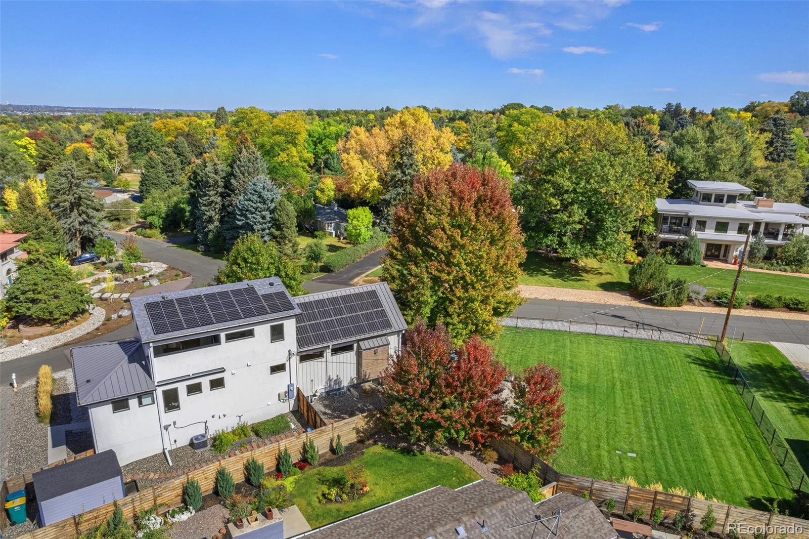 4077 Everett Street Wheat Ridge, CO 80033 - Photo 49 of 50 a view of a garden with a building in the background