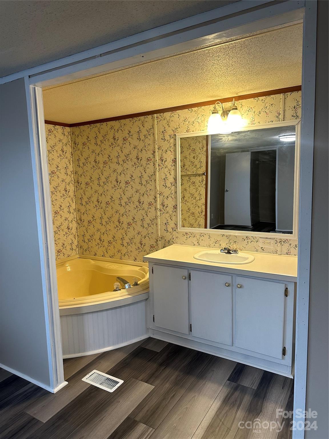 3549 Keystone Drive Sherrills Ford, NC 28673 - Photo 15 of 25 a bathroom with a bathtub and a sink