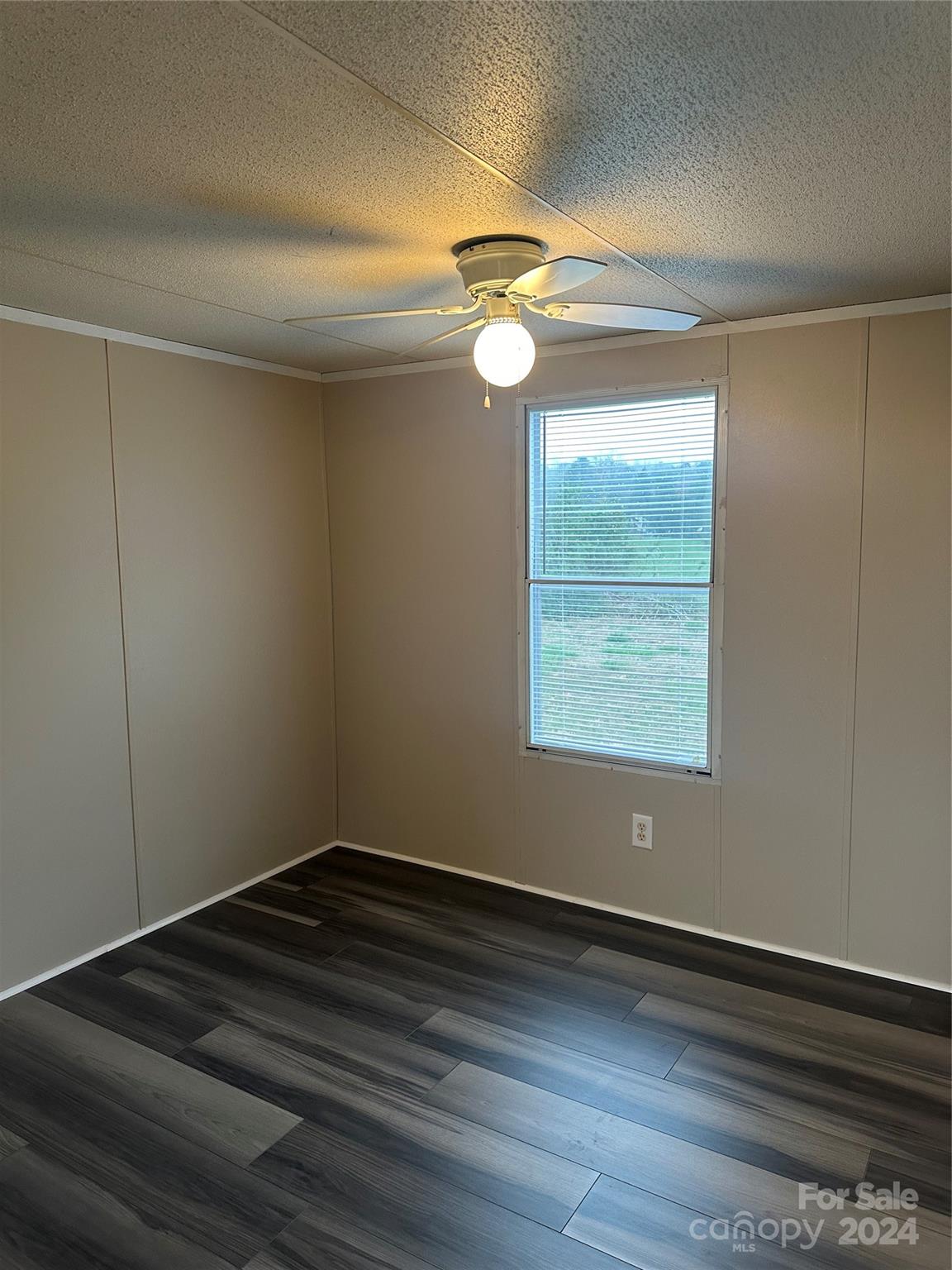 3549 Keystone Drive Sherrills Ford, NC 28673 - Photo 18 of 25 a view of empty room with wooden floor and fan
