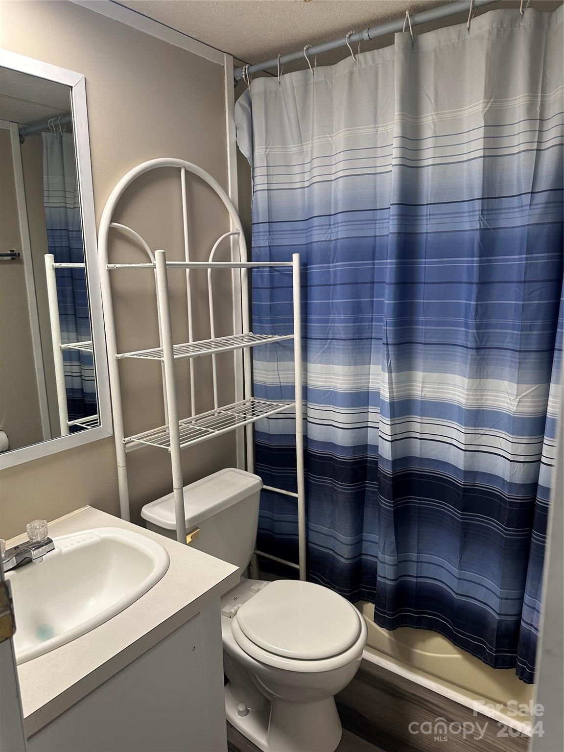 3549 Keystone Drive Sherrills Ford, NC 28673 - Photo 20 of 25 a bathroom with a sink toilet and shower