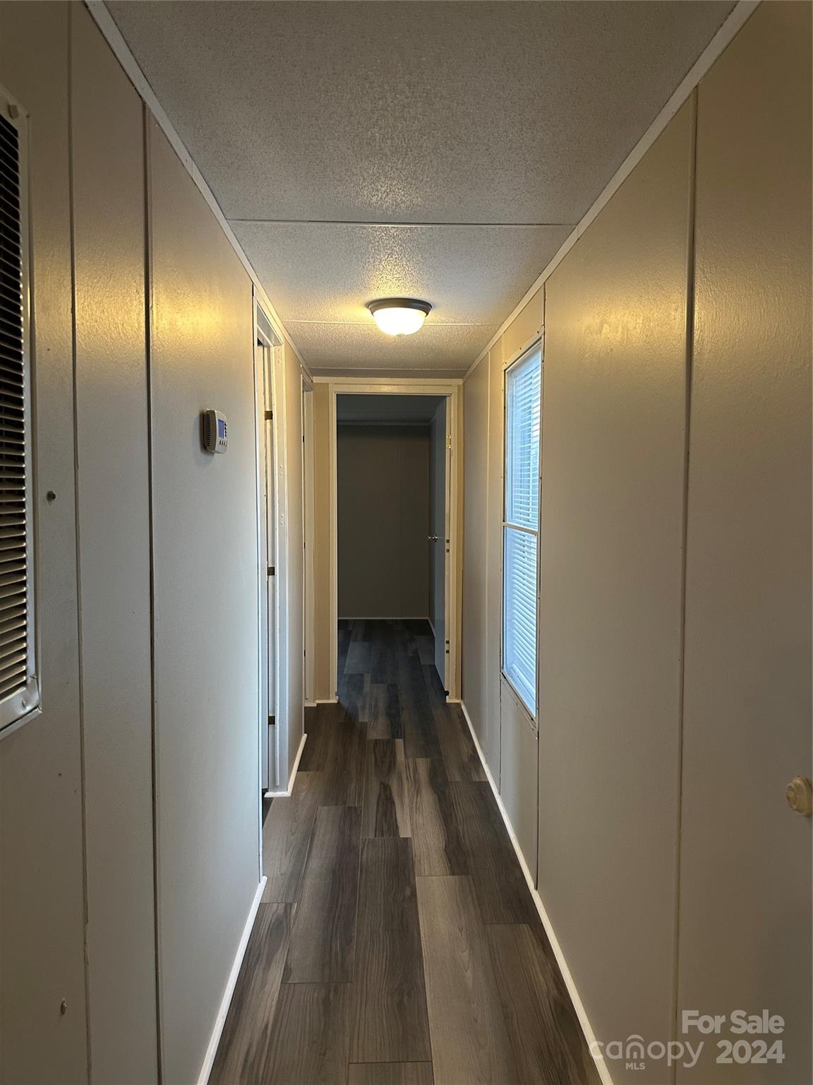 3549 Keystone Drive Sherrills Ford, NC 28673 - Photo 21 of 25 a view of a hallway with wooden floor