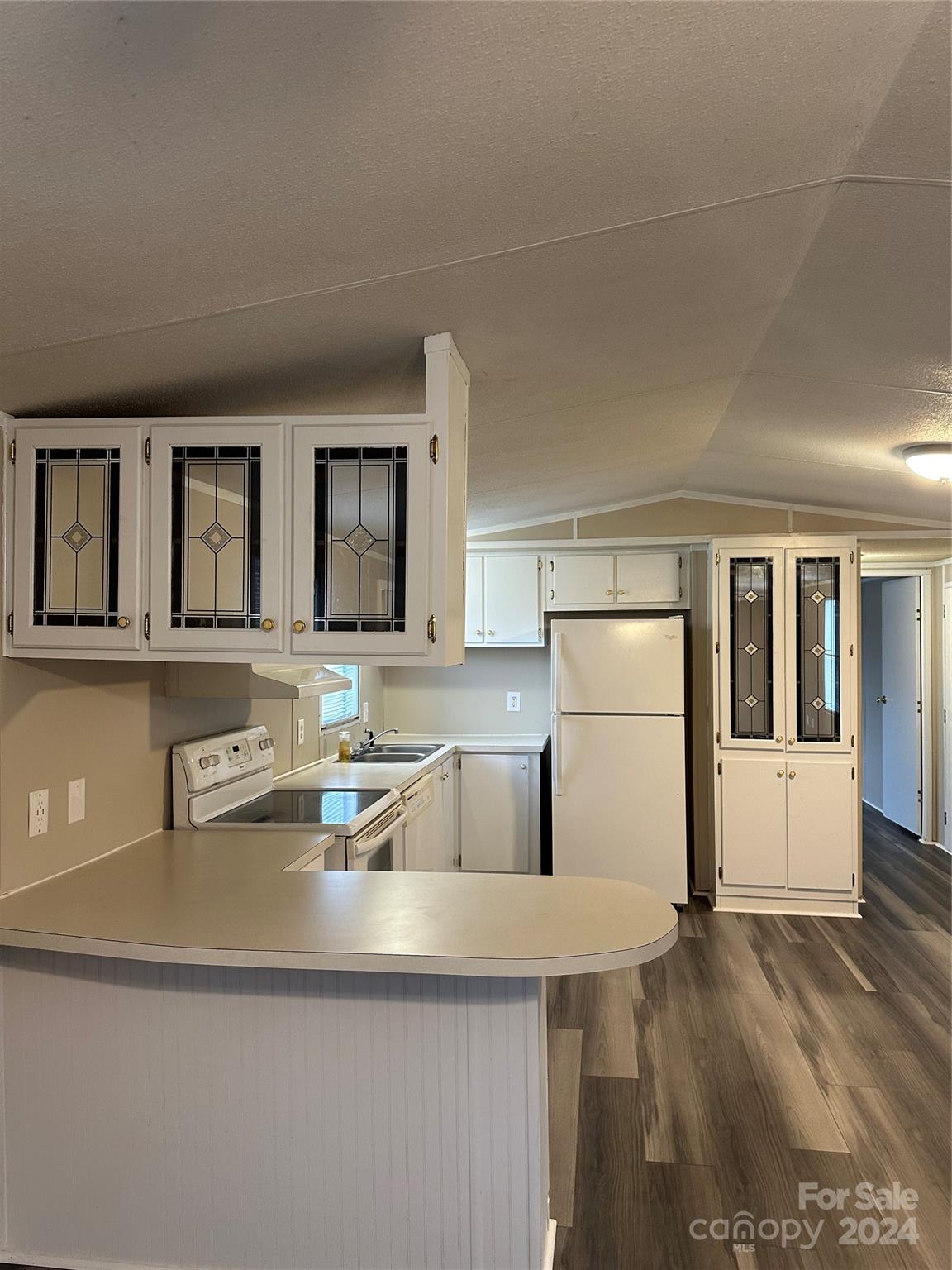 3549 Keystone Drive Sherrills Ford, NC 28673 - Photo 6 of 25 a kitchen with a sink a stove and refrigerator