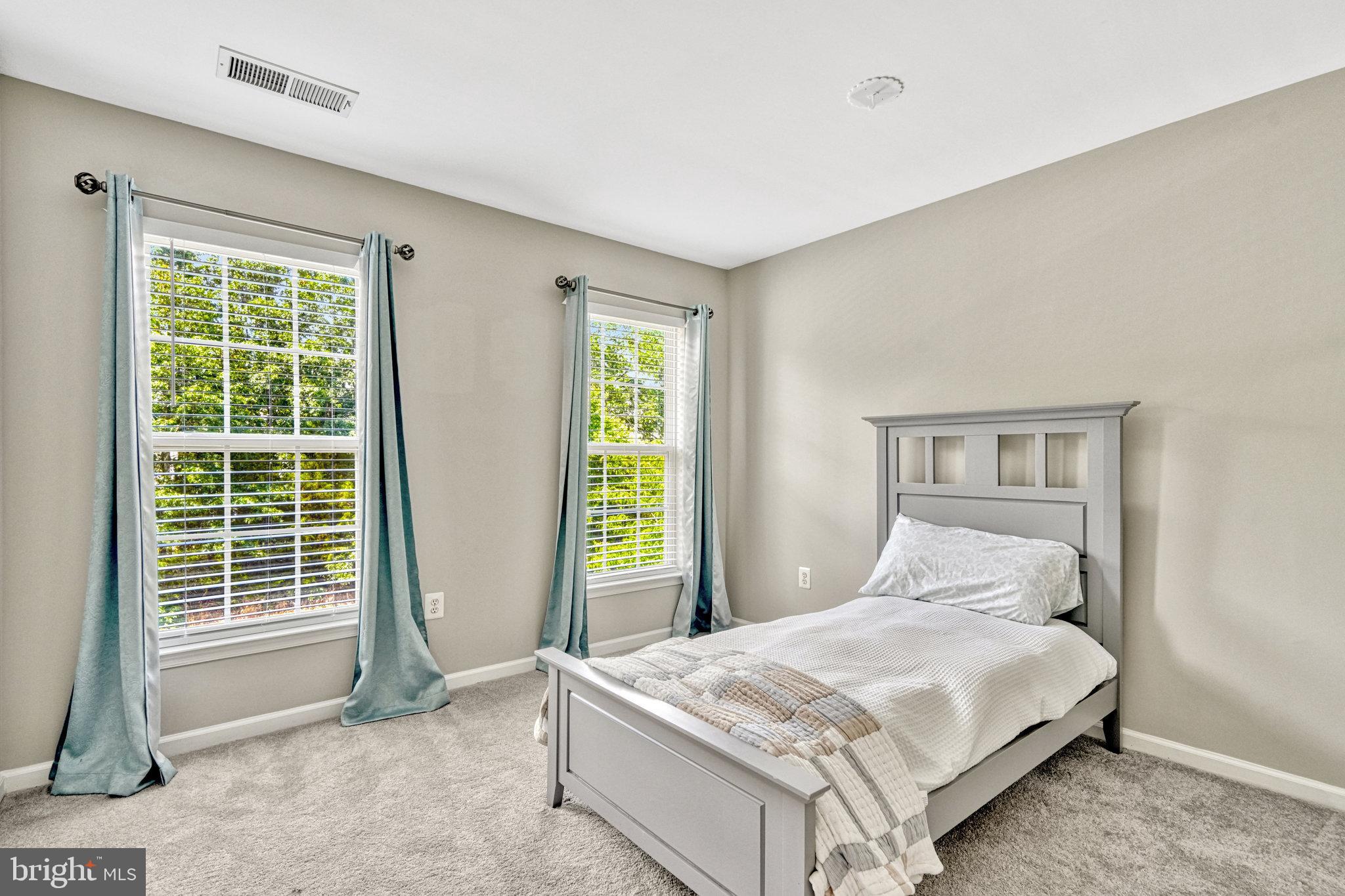 42751 Bennett Street Chantilly, VA 20152 - Photo 35 of 61 a bedroom with a bed and a window