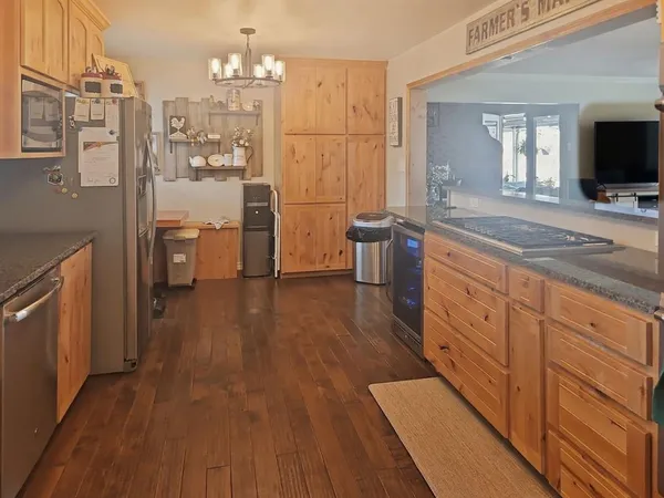 a spacious bathroom with a double vanity sink and a mirror