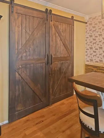a room with a wooden floor and furniture