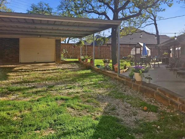 a view of a backyard with porch