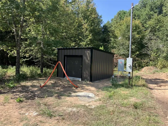 a view of backyard with green space