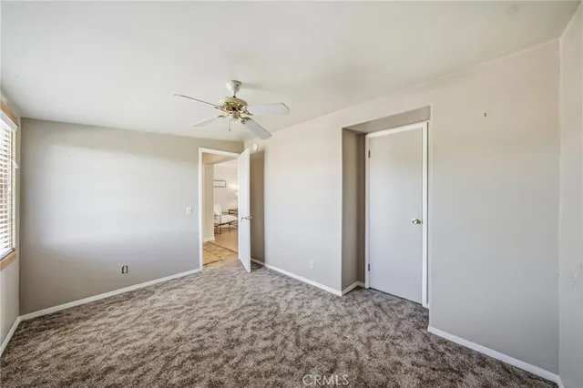 a kitchen with stainless steel appliances granite countertop a refrigerator a stove top oven a sink and dishwasher