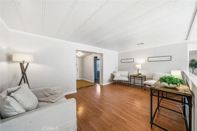 a bath tub sitting in a bathroom next to a window