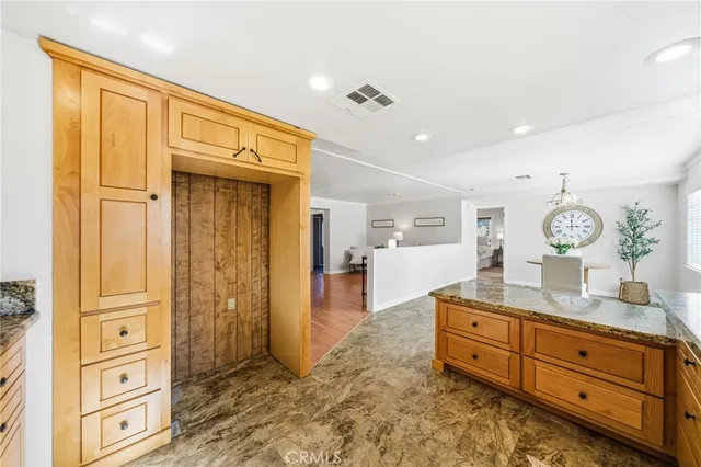 a bathroom with a sink a toilet and shower curtain