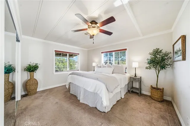 a view of a chair and table in the balcony