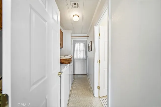 a view of backyard of house with green space