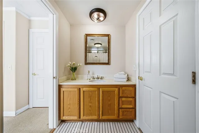 a view of a chairs and table in the garden