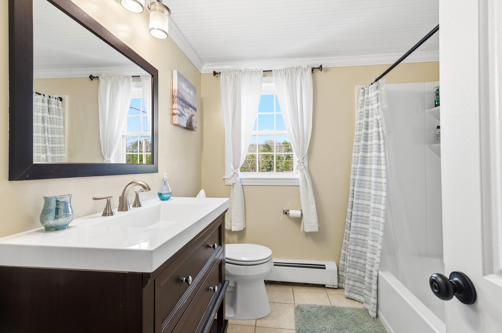 30 Huntington Road Plymouth, MA 02360 - Photo 18 of 35 a bathroom with a sink a toilet and shower