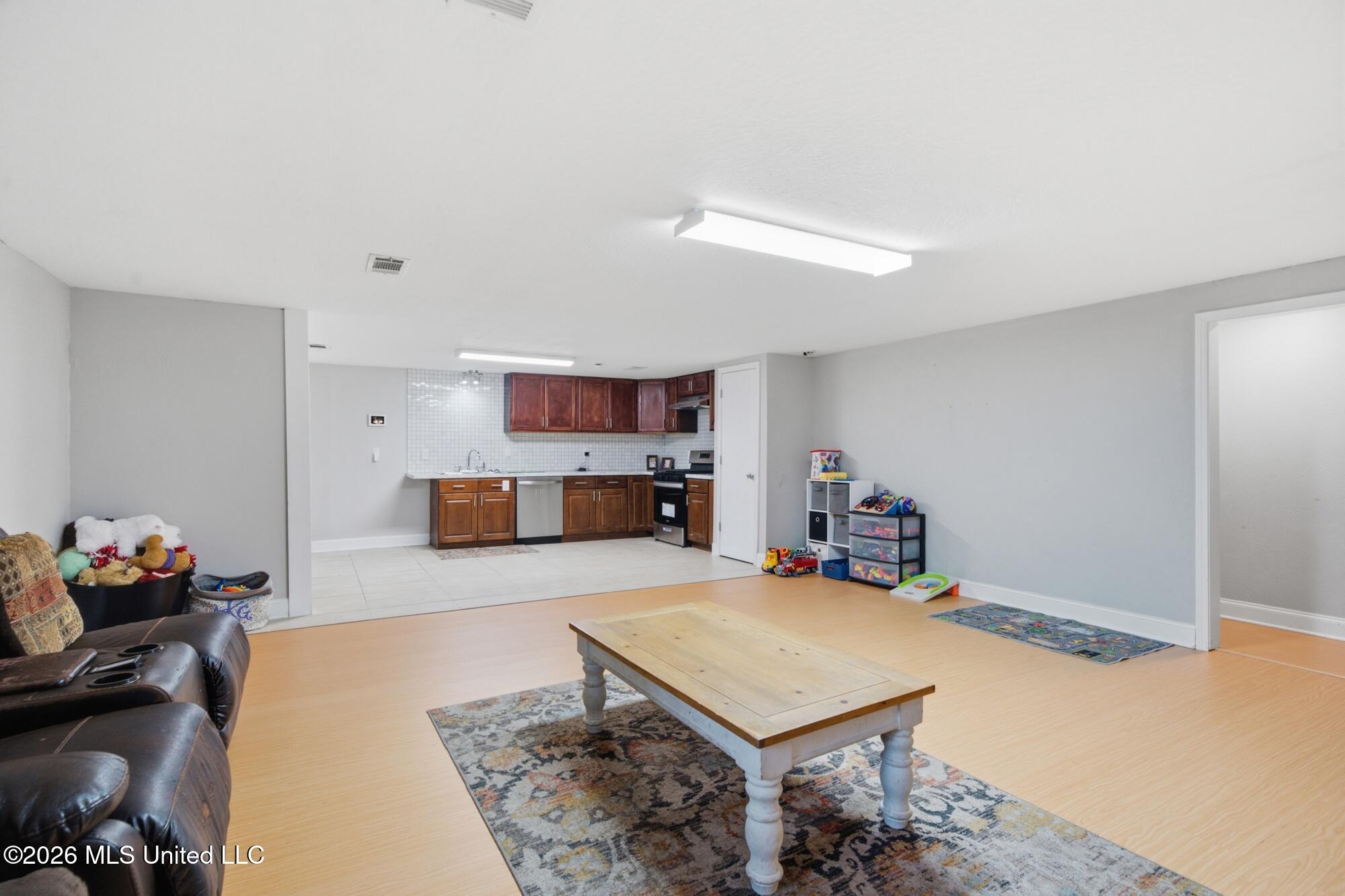 1508 Carterville Road Petal, MS 39465 - Photo 22 of 41 Living Room 2 Kitchen 2