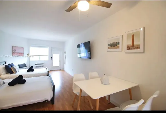 a bedroom with furniture and a bed