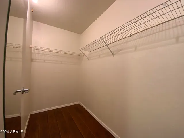 a view of a room with racks on the wall