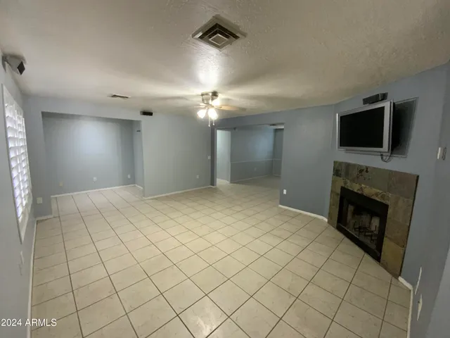 a view of a livingroom with a fireplace