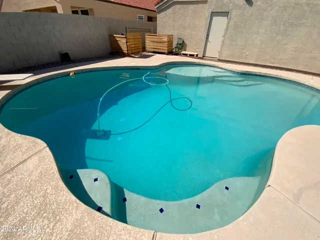 a view of a swimming pool with a window