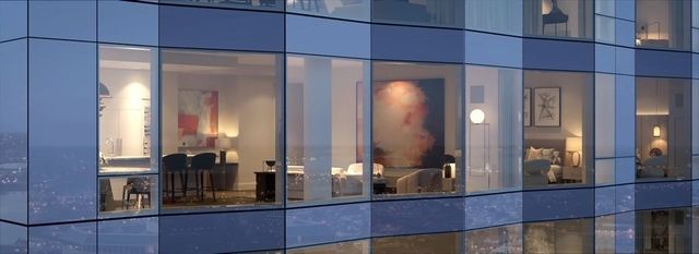 a bathroom with a mirror and shower