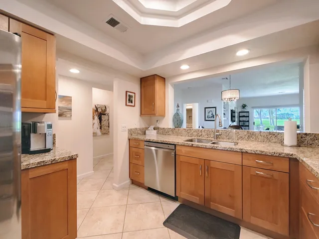 a large bathroom with a large mirror vanity and sink