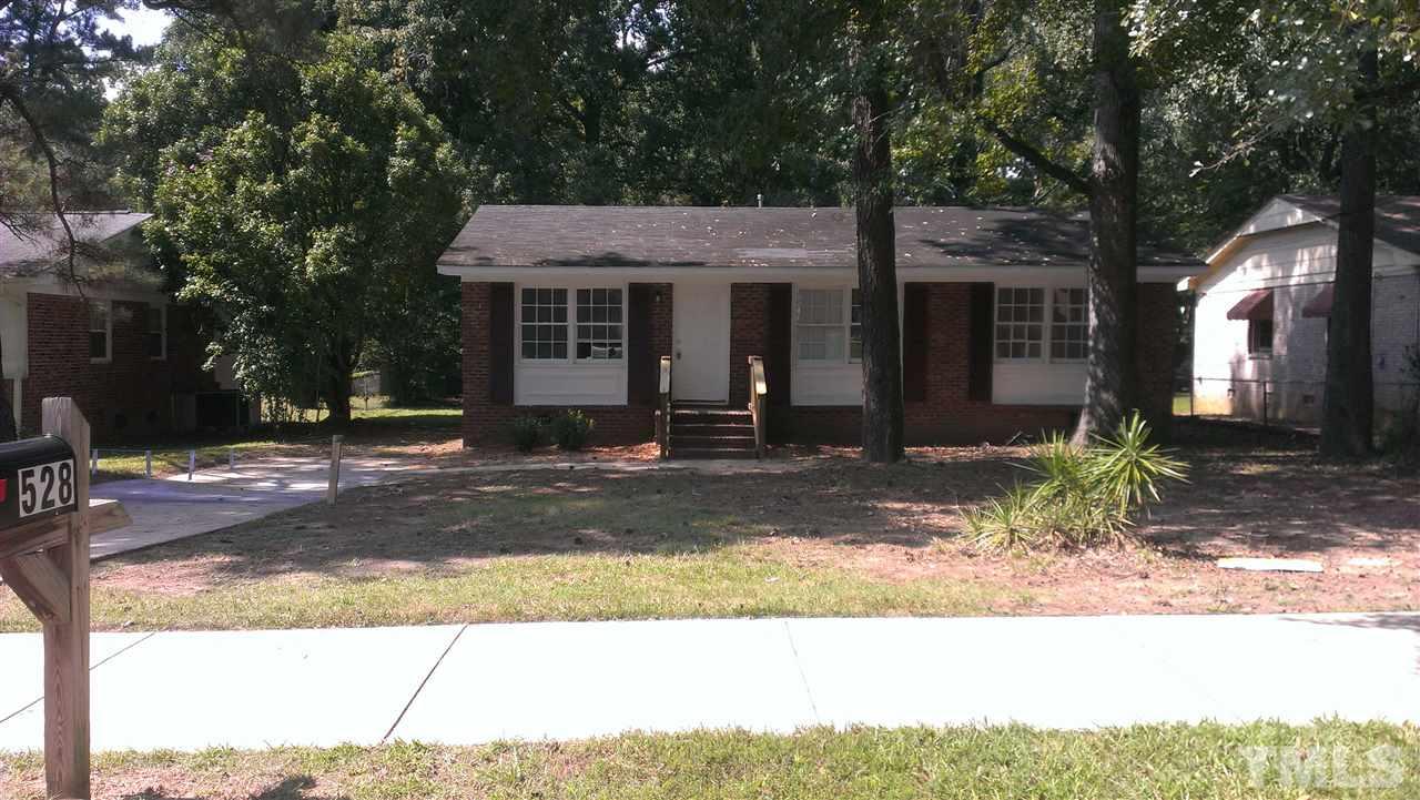 528 Dacian Road Raleigh, NC 27610 - Photo 1 of 5 a front view of a house with garden