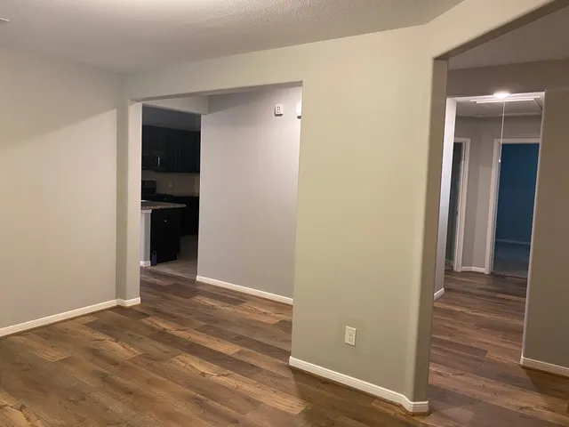 wooden floor and window in a room