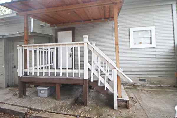 a view of a house with a roof deck