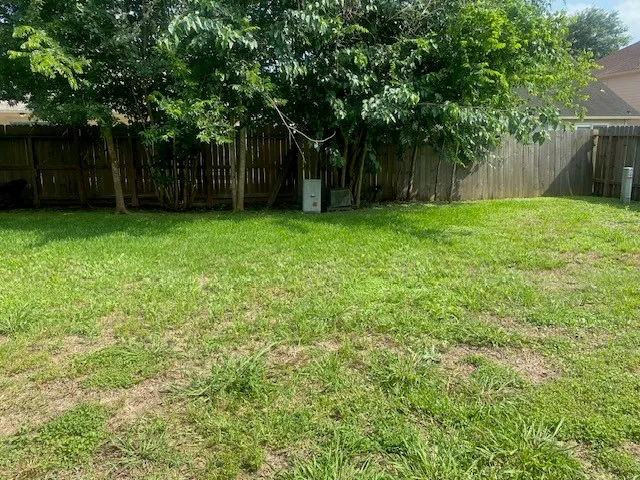 a fire hydrant in the middle of a field