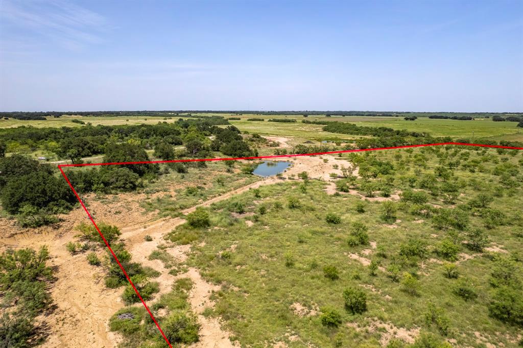 196 County Road 196 Bangs, TX 76823 - Photo 14 of 27 a view of a yard with an outdoor space
