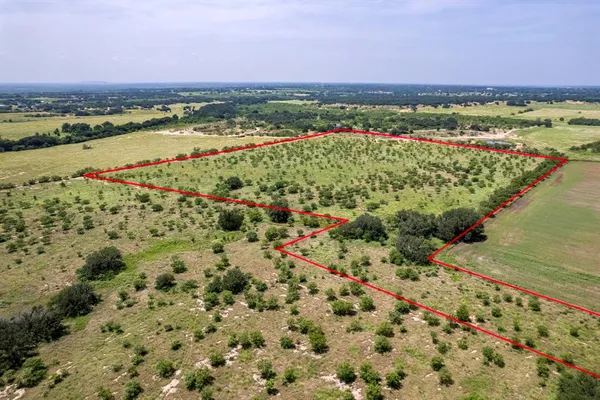 a view of a city with an ocean