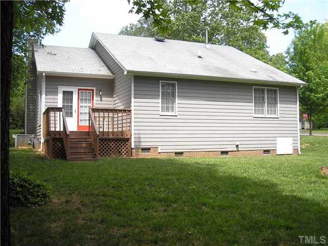 6301 Cape Charles Drive Raleigh, NC 27617 - Photo 10 of 19 a view of a house with a backyard