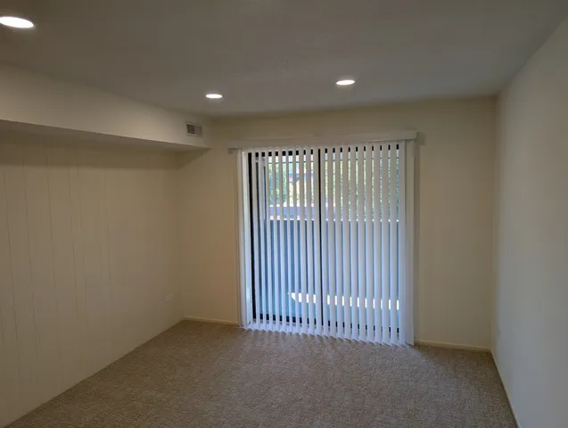 a living room with a couch and a table