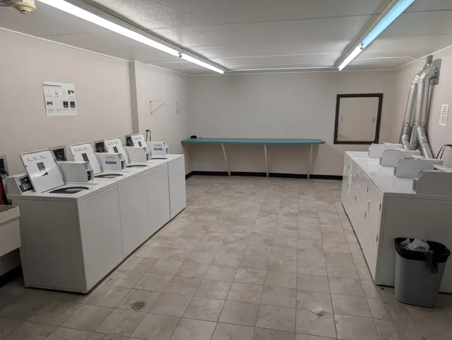 a view of livingroom with furniture and window